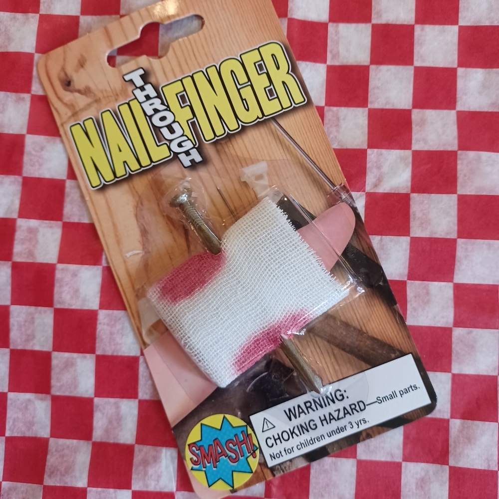 Nail Through Finger